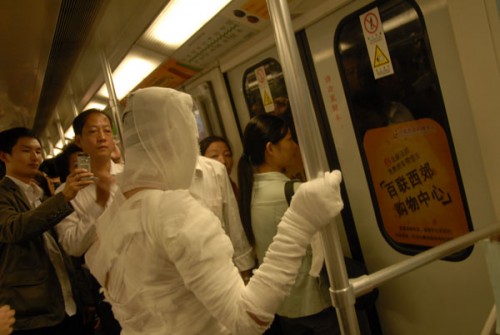 Shanghai subway mummy prepares to get off the metro.