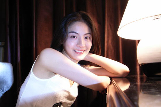 Gong Mi is a contestant on China's version of American Idol who first became popular for her Cecilia Cheung looks and then for whether she had plastic surgery.