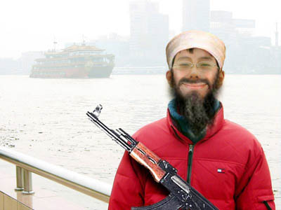 in laden with gun in laden. in laden gun bin laden wanted.