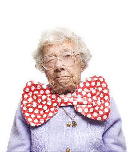 Crazy old lady wearing large polka-dotted bowtie.
