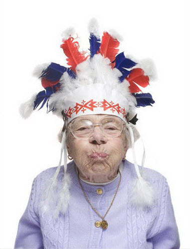 Crazy old lady wearing Native American headdress.