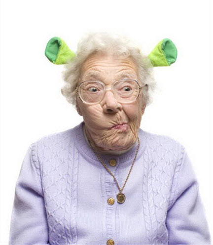Crazy old lady wearing Shrek ears.