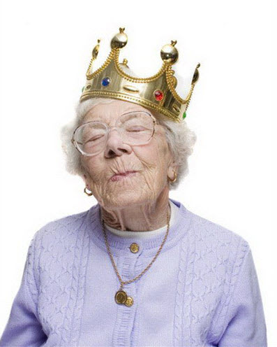 Crazy old lady wearing king's crown.