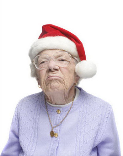 Crazy old lady wearing Santa's hat.