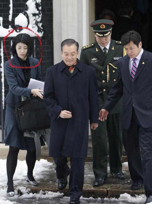 Zhang Lu accompanying Premier Wen Jiabao.