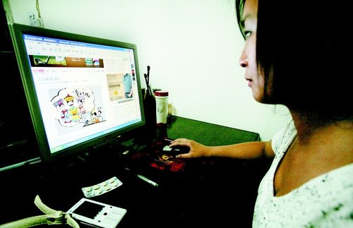 Chinese woman on computer.