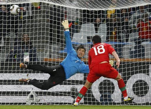 North Korean goal keeper fails to block Portugal shot.