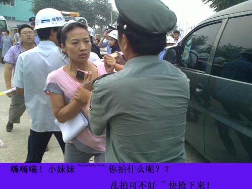 Chinese chengguan confronts a young woman.