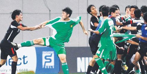 football-brawl-beijing-guo-an-singapore-young-lions.jpg