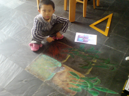 3D chalk art: planted vegetables, with son.