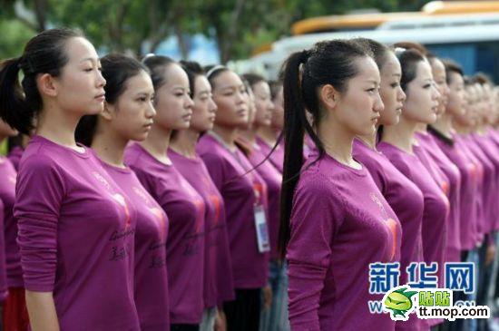 Military drill instructors ensure that the girls are perfectly uniform.