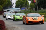 Lamborghinis and Ferraris as part of a Chinese wedding motorcade in Wenzhou city.