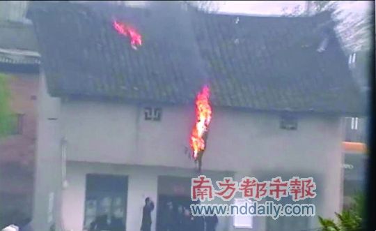 Man protesting forced demolition falls from roof after lighting self on fire.