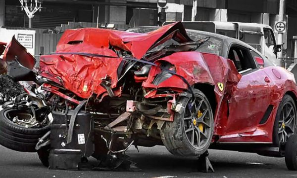 Crashed red Ferrari owned by a mainland Chinese man in Singapore.
