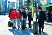 Bringing a spirit of "buy, buy, buy" to Japan, Chinese tourists on Japanese are often accompanied with shopping bags of various sizes.