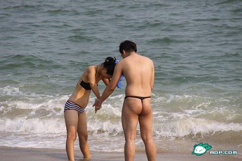 Big booty showing thong on beach